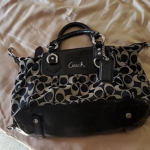 Coach black with tan C logo purse